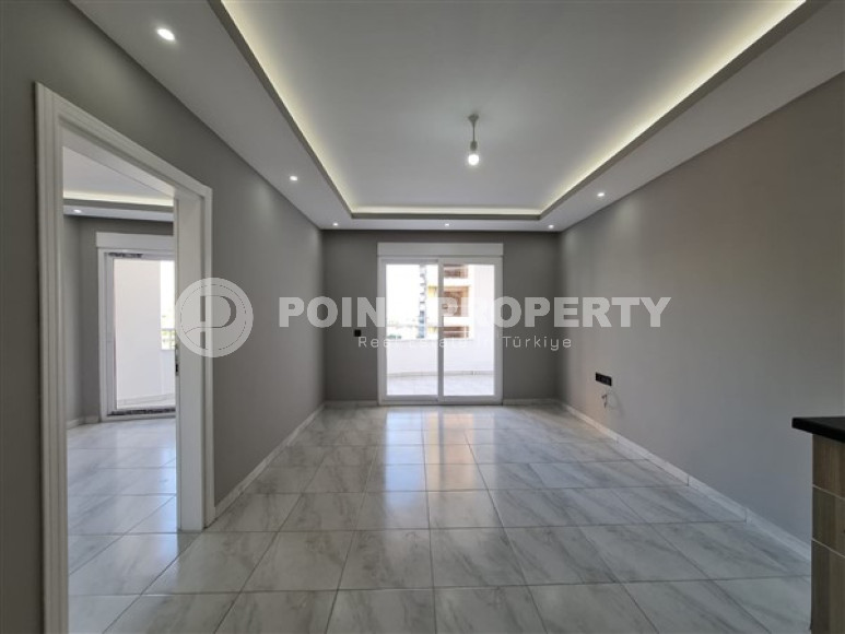 Просторная квартира с одной спальней, 65м², с видом на горы в 750м от моря в Махмутларе, Алания-id-2165-фото-8