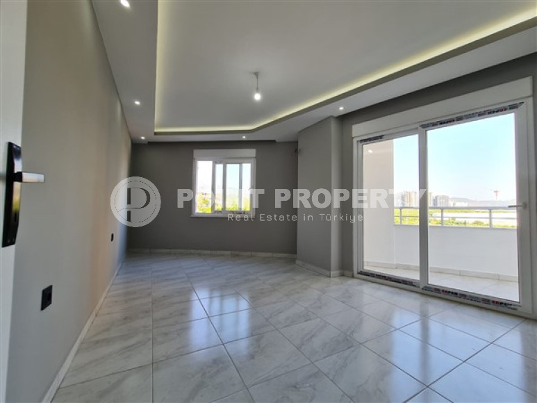 Просторная квартира с одной спальней, 65м², с видом на горы в 750м от моря в Махмутларе, Алания-id-2165-фото-12