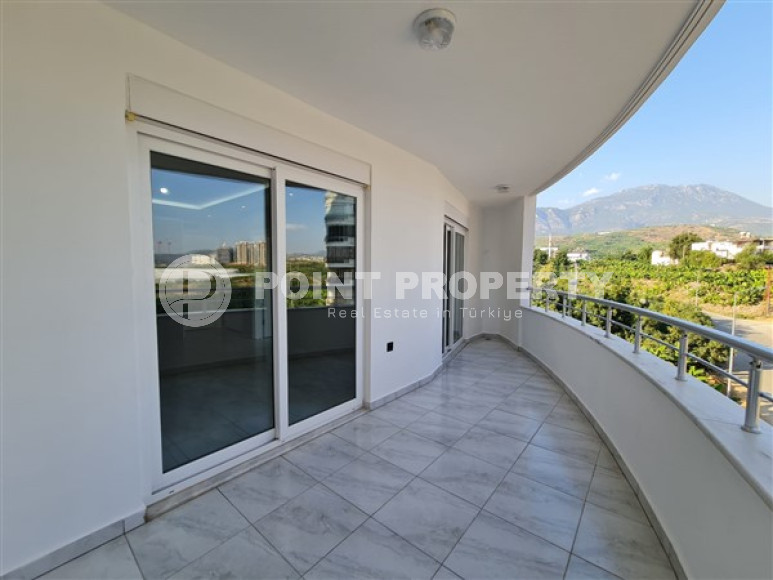 Просторная квартира с одной спальней, 65м², с видом на горы в 750м от моря в Махмутларе, Алания-id-2165-фото-15