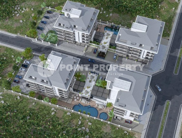 Квартиры в комплексе премиум класса на этапе строительства в 300м от моря в районе Каргыджак, Алания-id-2170-фото-3