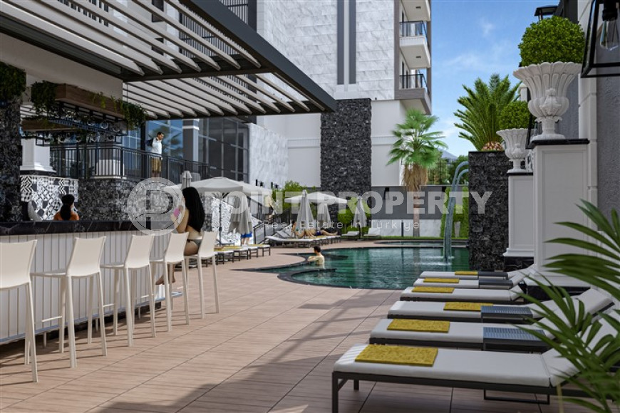 Квартиры в комплексе премиум класса на этапе строительства в 300м от моря в районе Каргыджак, Алания-id-2170-фото-12