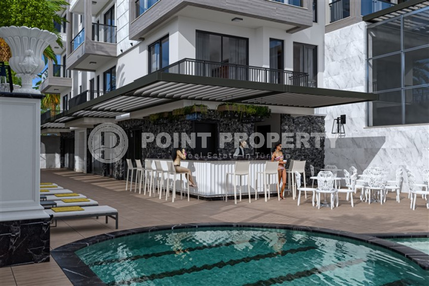 Квартиры в комплексе премиум класса на этапе строительства в 300м от моря в районе Каргыджак, Алания-id-2170-фото-14