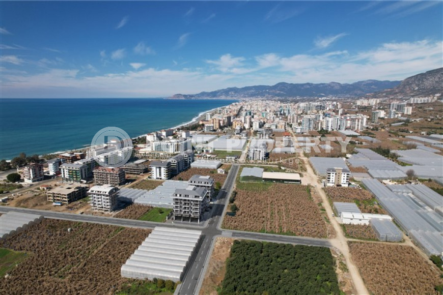 Квартиры в комплексе премиум класса на этапе строительства в 300м от моря в районе Каргыджак, Алания-id-2170-фото-23