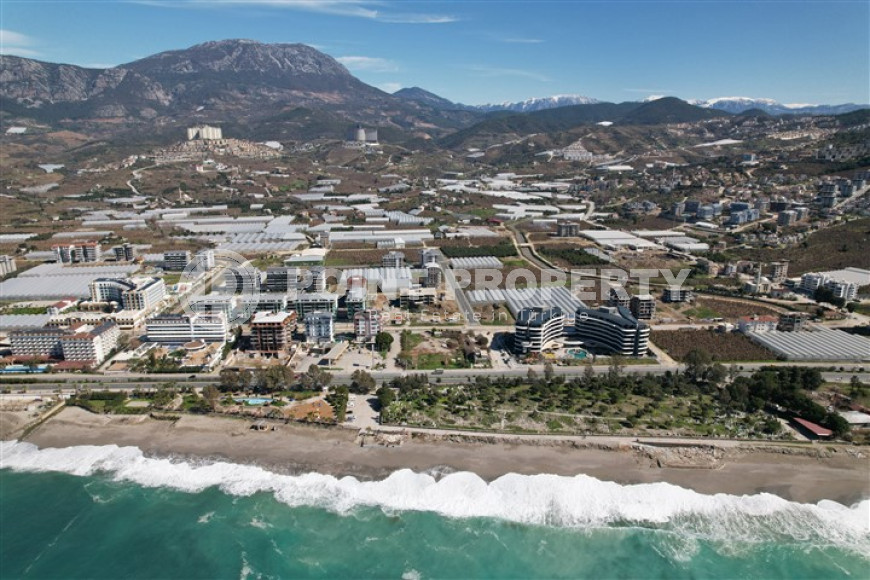 Квартиры в комплексе премиум класса на этапе строительства в 300м от моря в районе Каргыджак, Алания-id-2170-фото-25