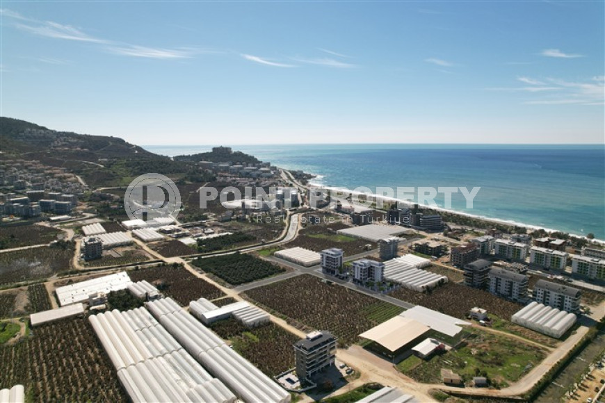 Квартиры в комплексе премиум класса на этапе строительства в 300м от моря в районе Каргыджак, Алания-id-2170-фото-27