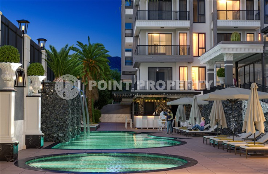 Квартиры в комплексе премиум класса на этапе строительства в 300м от моря в районе Каргыджак, Алания-id-2170-фото-35