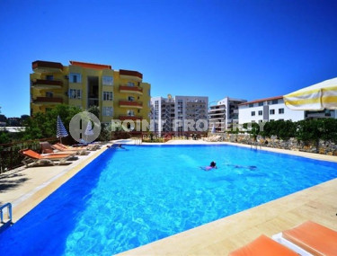 Уютная двухкомнатная квартира в резиденции с бассейном, в 300м от моря в районе Алании Тосмур-id-2186-фото-2