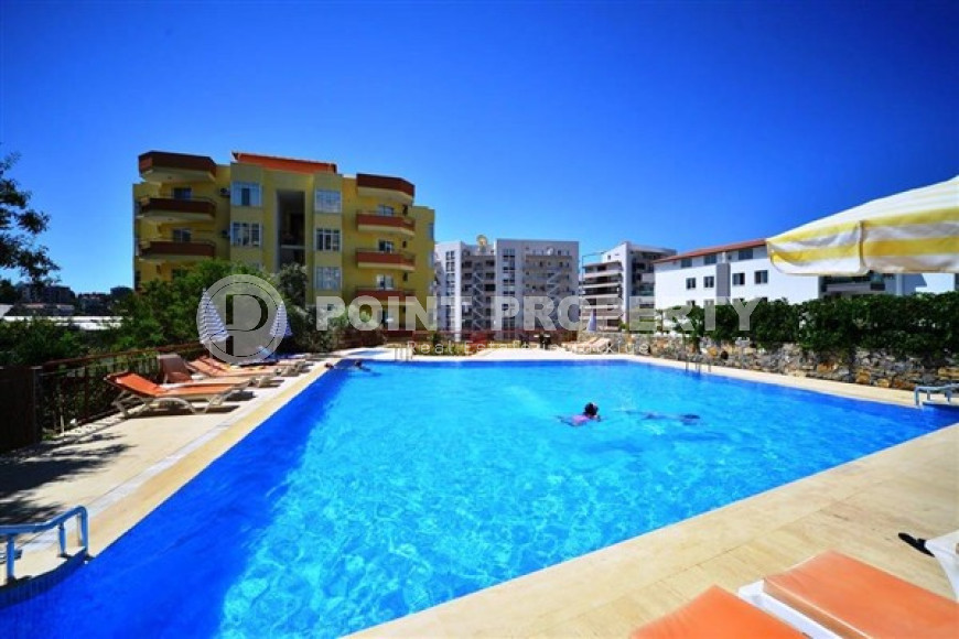 Уютная двухкомнатная квартира в резиденции с бассейном, в 300м от моря в районе Алании Тосмур-id-2186-фото-2