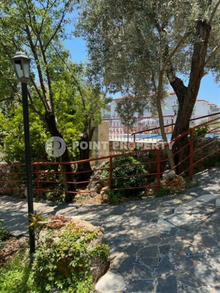 Уютная двухкомнатная квартира в резиденции с бассейном, в 300м от моря в районе Алании Тосмур-id-2186-фото-4