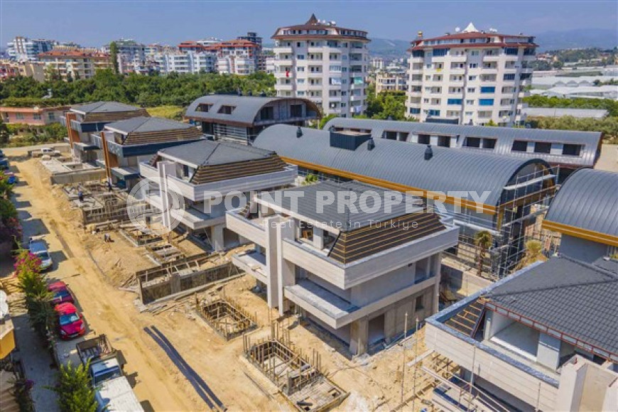 Фешенебельная вилла с четырьмя спальнями, 226м², в районе Авсаллар, Алания, в 500 метрах от моря-id-2201-фото-7