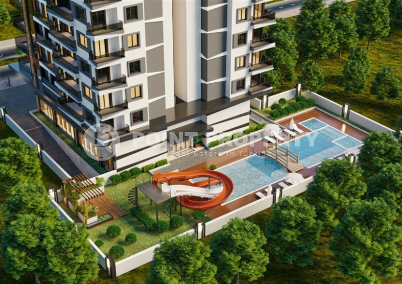 Apartment 2+1 in a premium class complex under construction in Mahmutlar, 100m from the sea at an attractive price-id-1180-photo-2