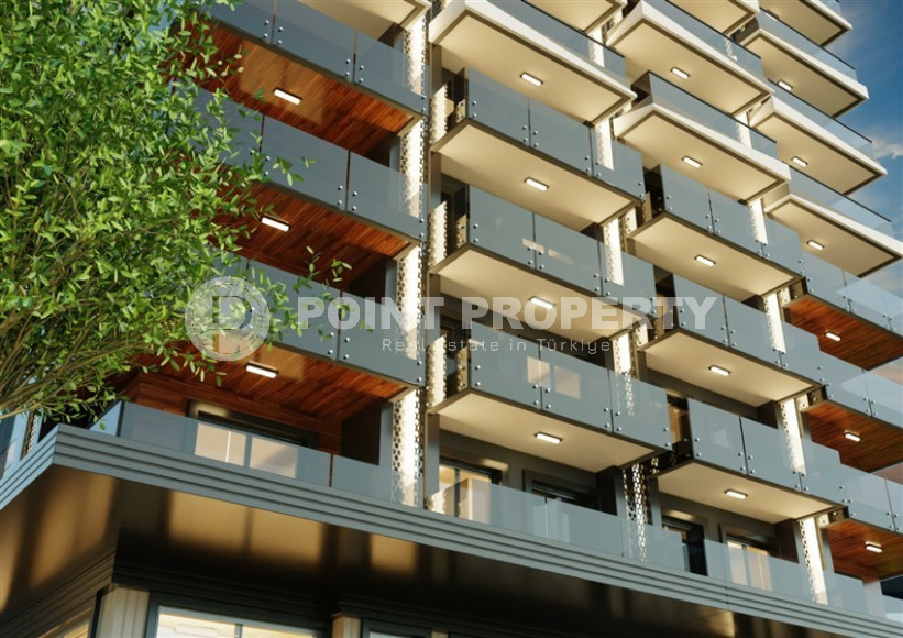 Apartment 2+1 in a premium class complex under construction in Mahmutlar, 100m from the sea at an attractive price-id-1180-photo-4