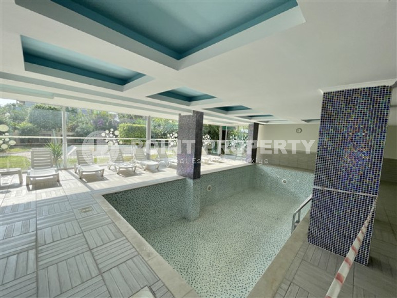 Элегантная двухкомнатная квартира, 70м², в комплексе премиум класса в 100м от моря в Кестеле, Алания-id-2216-фото-19