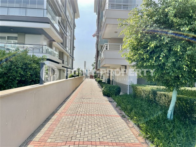 Элегантная двухкомнатная квартира, 70м², в комплексе премиум класса в 100м от моря в Кестеле, Алания-id-2216-фото-23