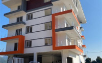 Семейные квартиры, 2+1, 3+1, 4+1, 101-212м², в доме городского типа в горном районе Алании Чиплаклы-id-2222-фото-1