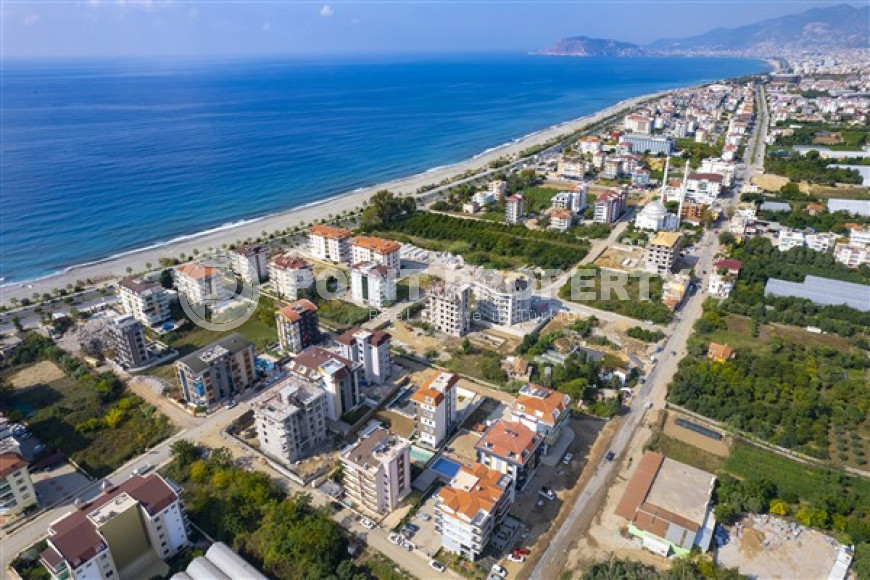 Просторная квартира с тремя спальнями, 230м², в комплексе с бассейном у моря в Кестеле, Алания-id-2224-фото-28