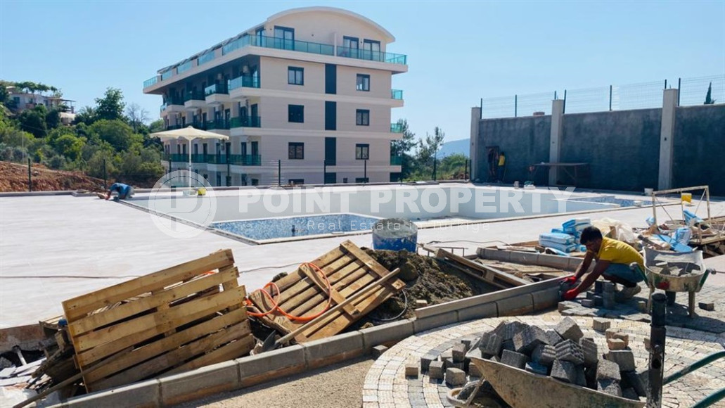 Furnished 1+1 apartment in a residence with infrastructure at the final stage of construction in the Oba district-id-1182-photo-14