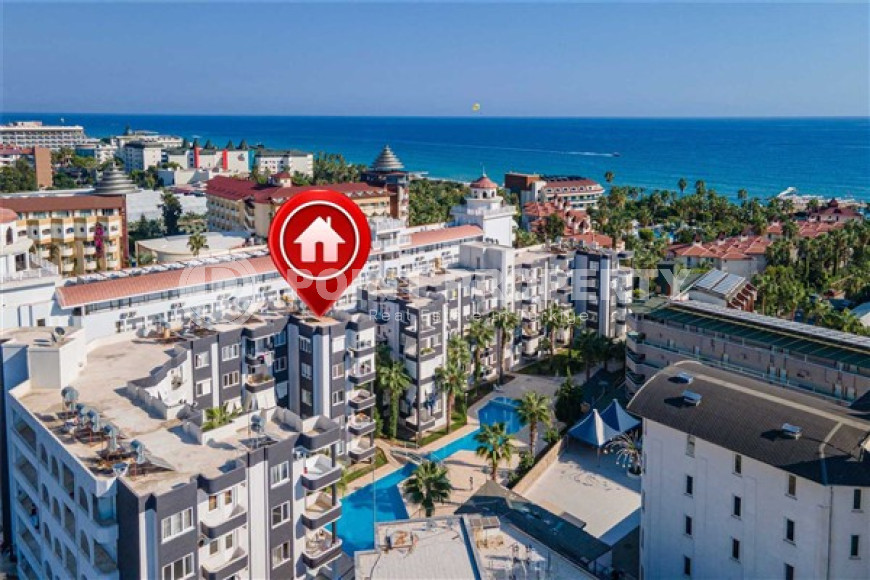 Трехкомнатная квартира, 85м², в уютной резиденции с бассейном на берегу моря в районе Алании Конаклы-id-2229-фото-3