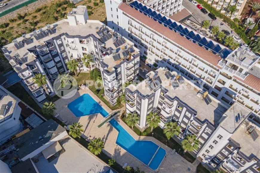 Трехкомнатная квартира, 85м², в уютной резиденции с бассейном на берегу моря в районе Алании Конаклы-id-2229-фото-22