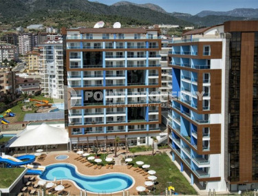 Elegant one-bedroom apartment, 77m², in a luxury complex in Alanya - Cikcilli-id-2231-photo-1