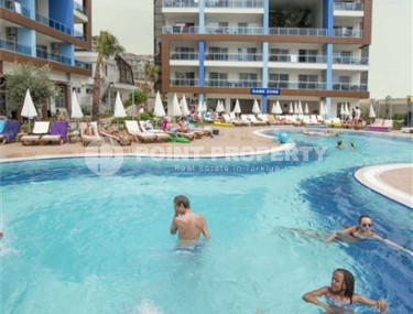 Elegant one-bedroom apartment, 77m², in a luxury complex in Alanya - Cikcilli-id-2231-photo-2