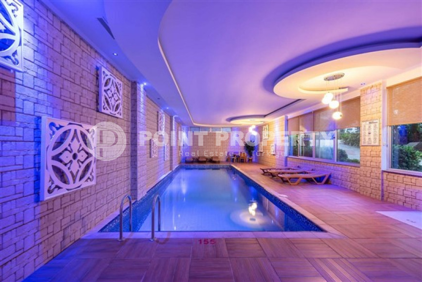 Elegant one-bedroom apartment, 77m², in a luxury complex in Alanya - Cikcilli-id-2231-photo-7