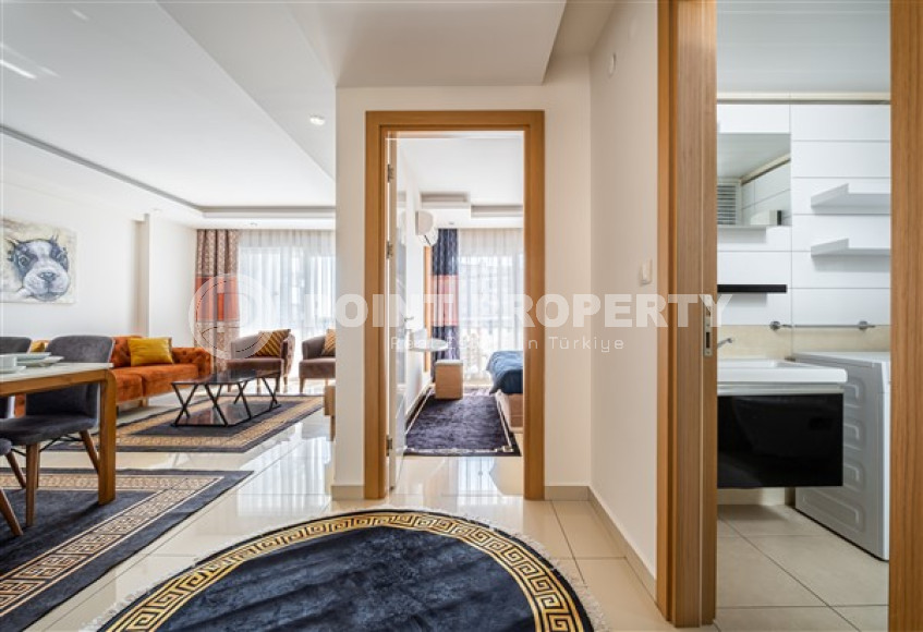 Elegant one-bedroom apartment, 77m², in a luxury complex in Alanya - Cikcilli-id-2231-photo-10