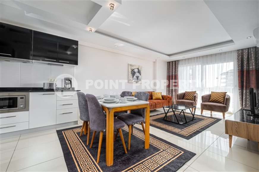 Elegant one-bedroom apartment, 77m², in a luxury complex in Alanya - Cikcilli-id-2231-photo-12