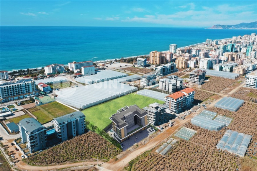 Investment project with interest-free installments just 300 from the beach, Kargicak-id-1016-photo-2