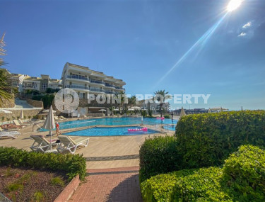 Элегантная двухуровневая квартира, 110м² в уютной резиденции в районе Алании Конаклы, в 300м от моря-id-2232-фото-2