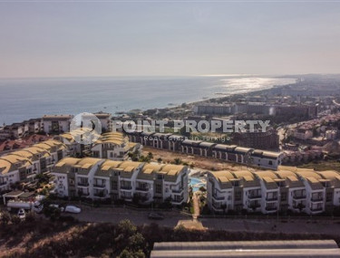 Элегантная двухуровневая квартира, 110м² в уютной резиденции в районе Алании Конаклы, в 300м от моря-id-2232-фото-4