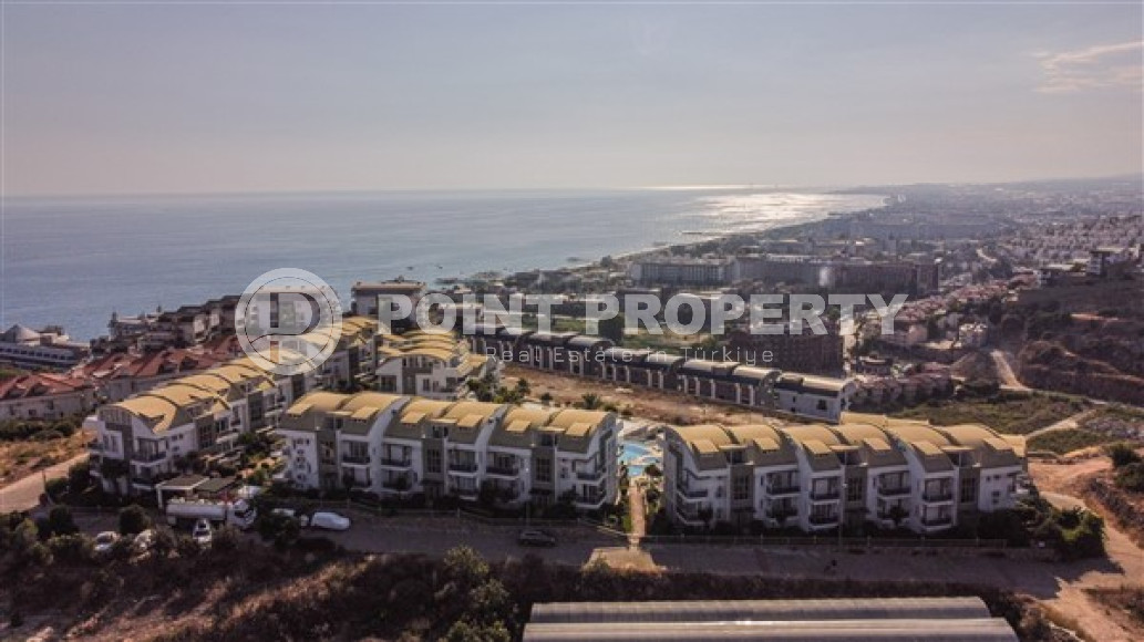 Элегантная двухуровневая квартира, 110м² в уютной резиденции в районе Алании Конаклы, в 300м от моря-id-2232-фото-4