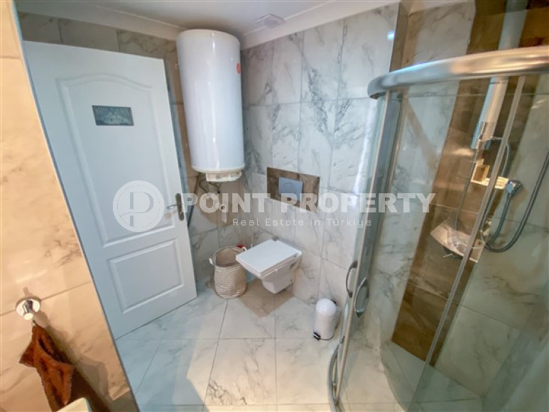 Элегантная двухуровневая квартира, 110м² в уютной резиденции в районе Алании Конаклы, в 300м от моря-id-2232-фото-26