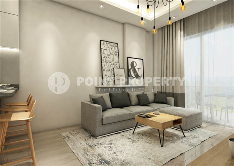 Старт продаж: квартиры с двумя и тремя спальнями, 70-138м², в новом проекте с инфраструктурой в центре Алании-id-2235-фото-11