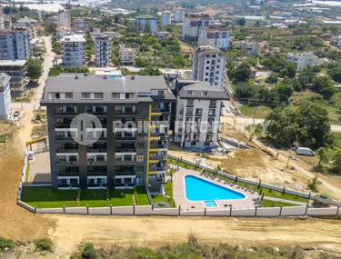 Two-room apartment with a private garden, 1500 meters from the sea, Avsallar area-id-2245-photo-1
