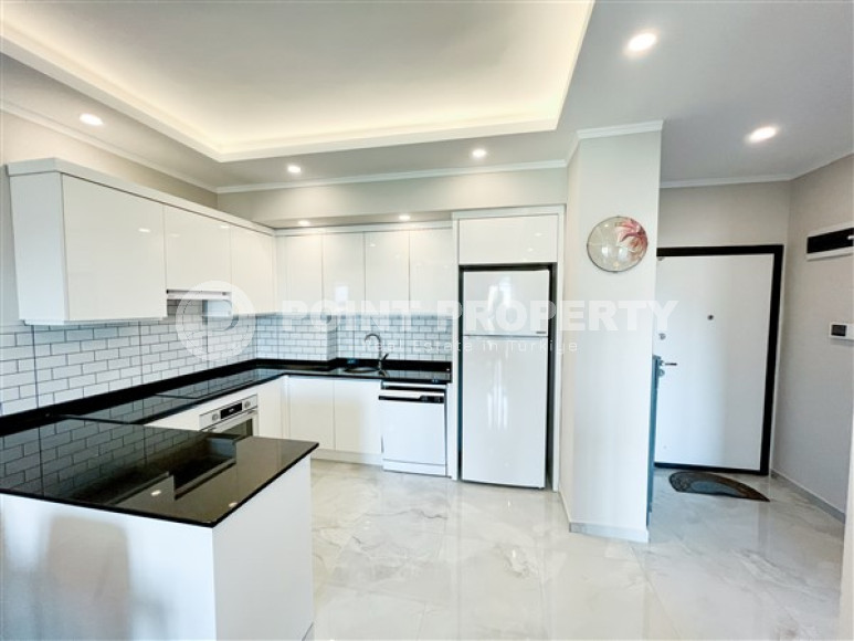 Two-room apartment with a private garden, 1500 meters from the sea, Avsallar area-id-2245-photo-4