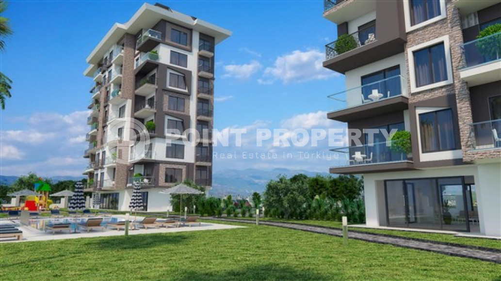 Апартаменты с одной спальней 65 кв. м  в 200 метрах от моря в новом комплексе уединенного района Демирташ, Алания.-id-2252-фото-8