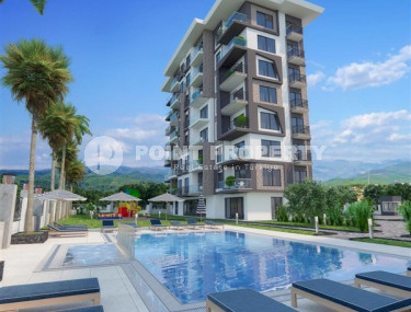 Апартаменты с одной спальней 65 кв. м  в 200 метрах от моря в новом комплексе уединенного района Демирташ, Алания.-id-2252-фото-5