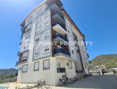 Квартира с двумя спальнями, 110м², с отдельной кухней, в новой резиденции в Газипаше, Алания-id-2259-фото-1