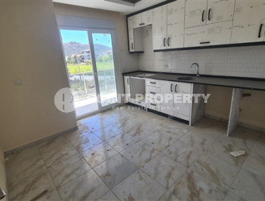 Квартира с двумя спальнями, 110м², с отдельной кухней, в новой резиденции в Газипаше, Алания-id-2259-фото-2