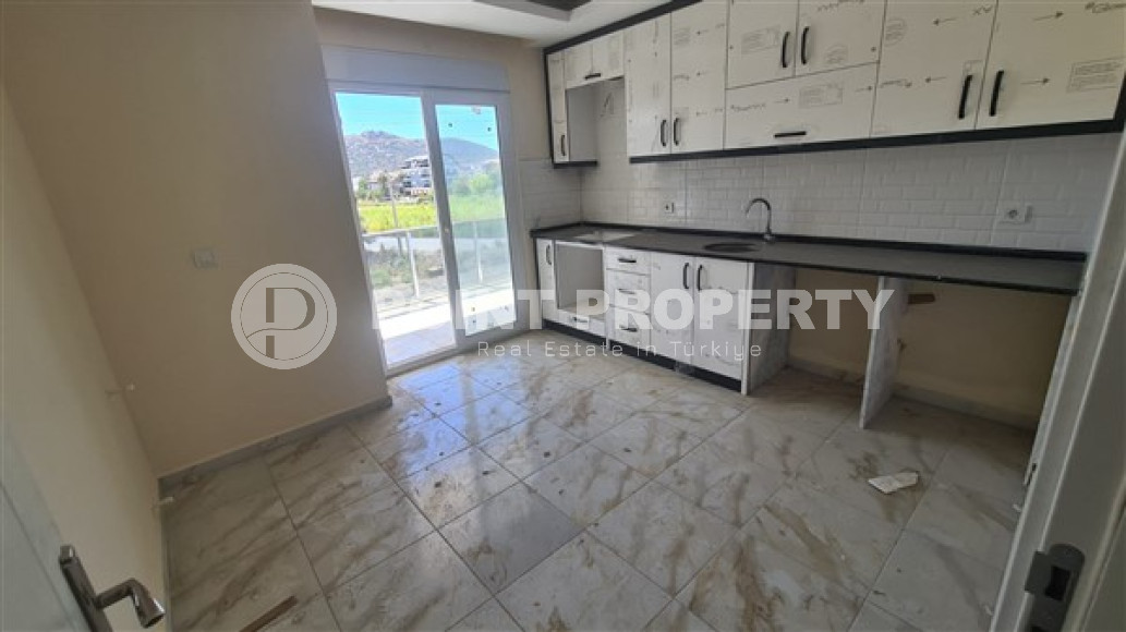 Квартира с двумя спальнями, 110м², с отдельной кухней, в новой резиденции в Газипаше, Алания-id-2259-фото-2