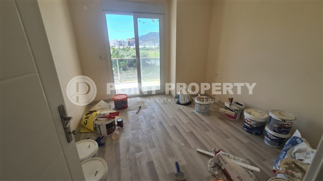 Квартира с двумя спальнями, 110м², с отдельной кухней, в новой резиденции в Газипаше, Алания-id-2259-фото-10