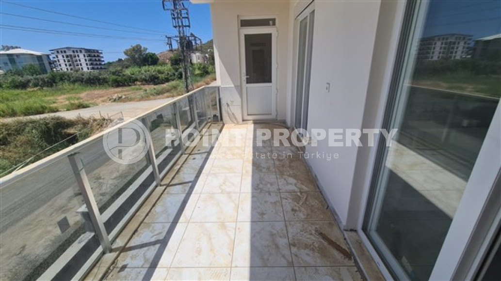 Квартира с двумя спальнями, 110м², с отдельной кухней, в новой резиденции в Газипаше, Алания-id-2259-фото-14