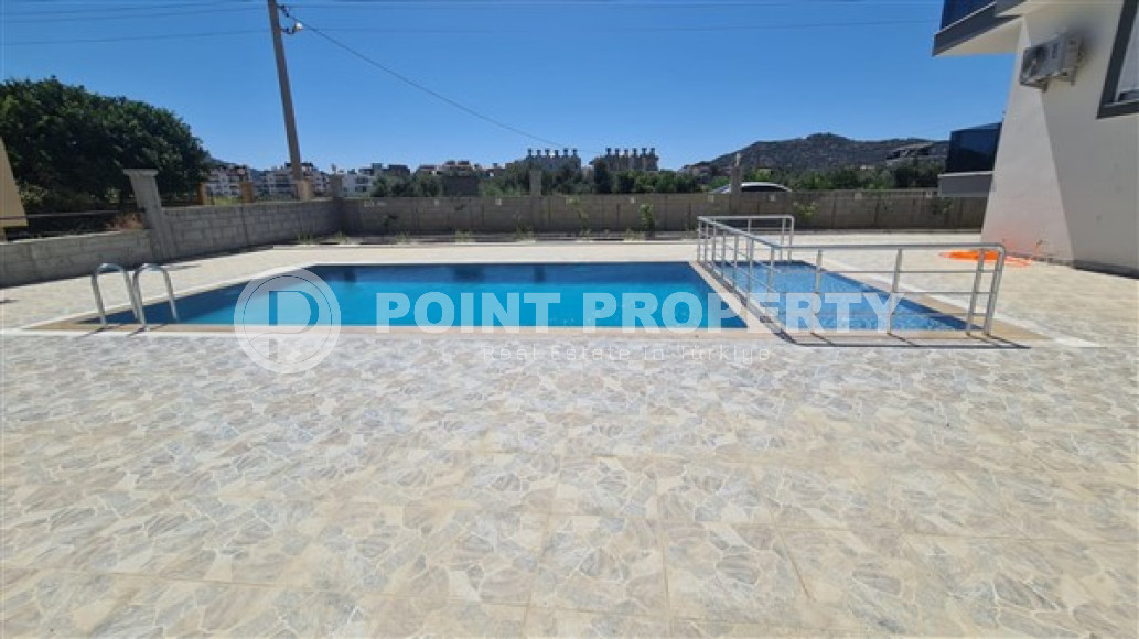 Квартира с двумя спальнями, 110м², с отдельной кухней, в новой резиденции в Газипаше, Алания-id-2259-фото-23