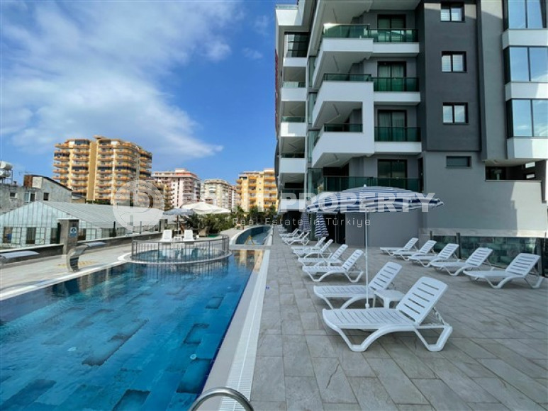 Новая квартира с двумя спальнями, 105м² с видом на море в новом комплексе в Каргыджаке, Алания-id-2260-фото-2