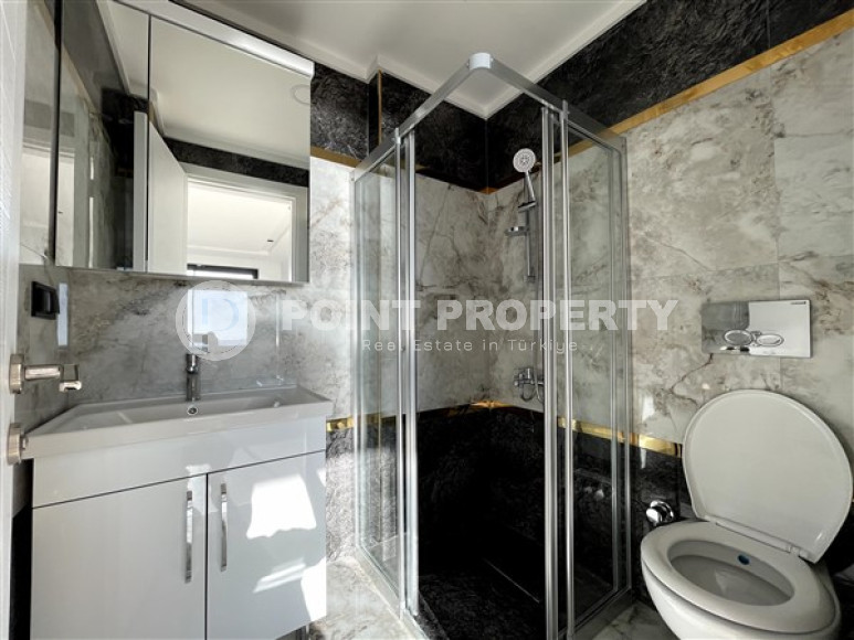 Новая квартира с двумя спальнями, 105м² с видом на море в новом комплексе в Каргыджаке, Алания-id-2260-фото-10