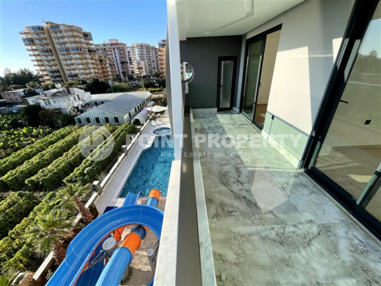 Новая квартира с двумя спальнями, 105м² с видом на море в новом комплексе в Каргыджаке, Алания-id-2260-фото-13