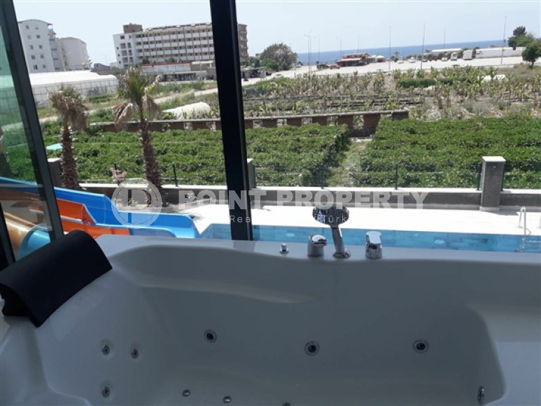 Новая квартира с двумя спальнями, 105м² с видом на море в новом комплексе в Каргыджаке, Алания-id-2260-фото-24