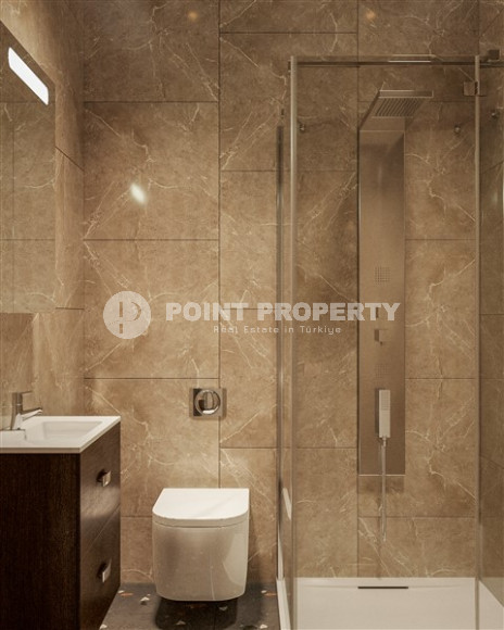 A new, modern premium class complex under construction with apartments of different layouts, ranging from 48 to 150 m² in the attractive Oba area, Alanya.-id-2267-photo-9