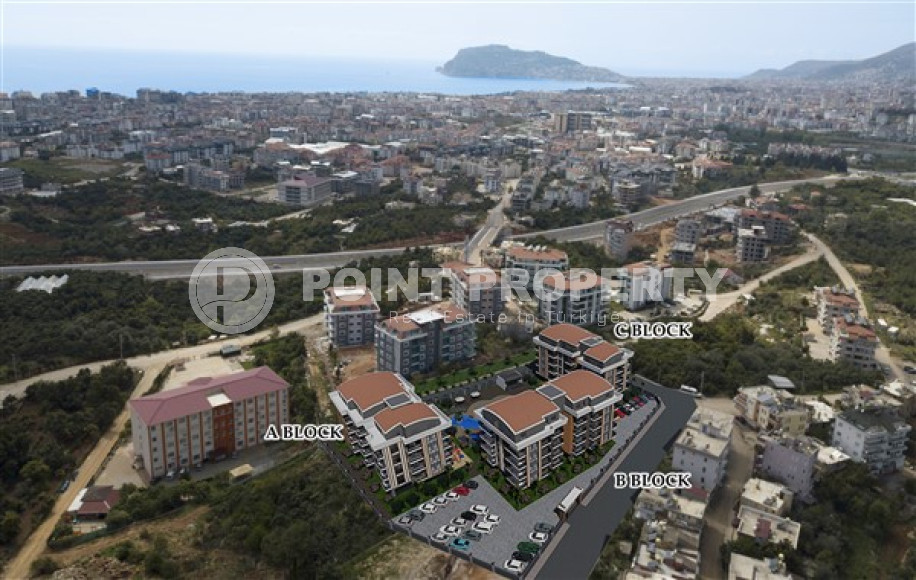 A new, modern premium class complex under construction with apartments of different layouts, ranging from 48 to 150 m² in the attractive Oba area, Alanya.-id-2267-photo-16